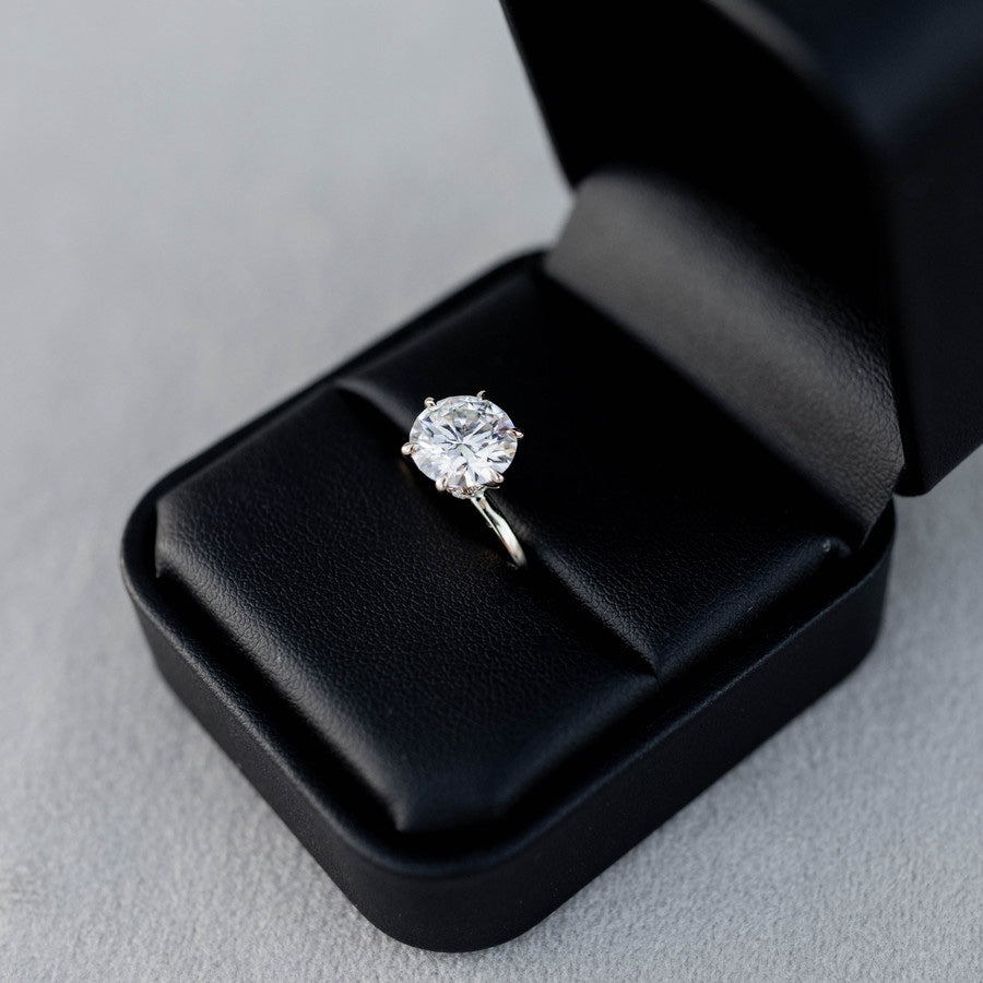 Shown with 3ct (9mm) Moissanite