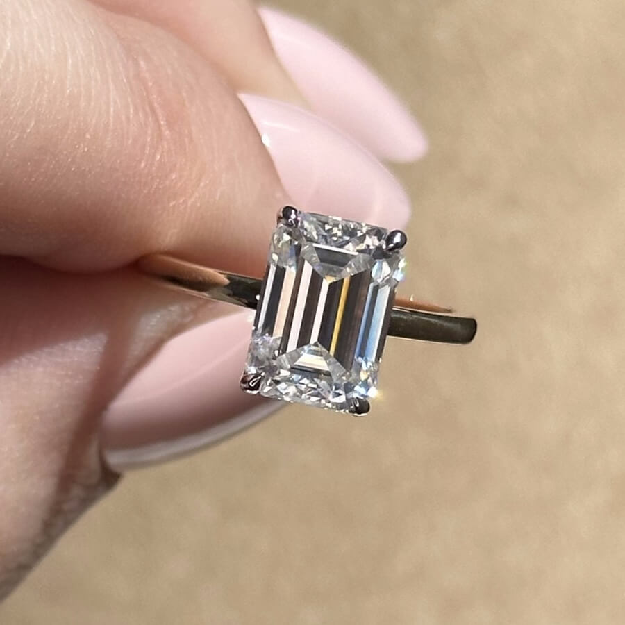 Shown with 3ct (10x7mm) Moissanite
