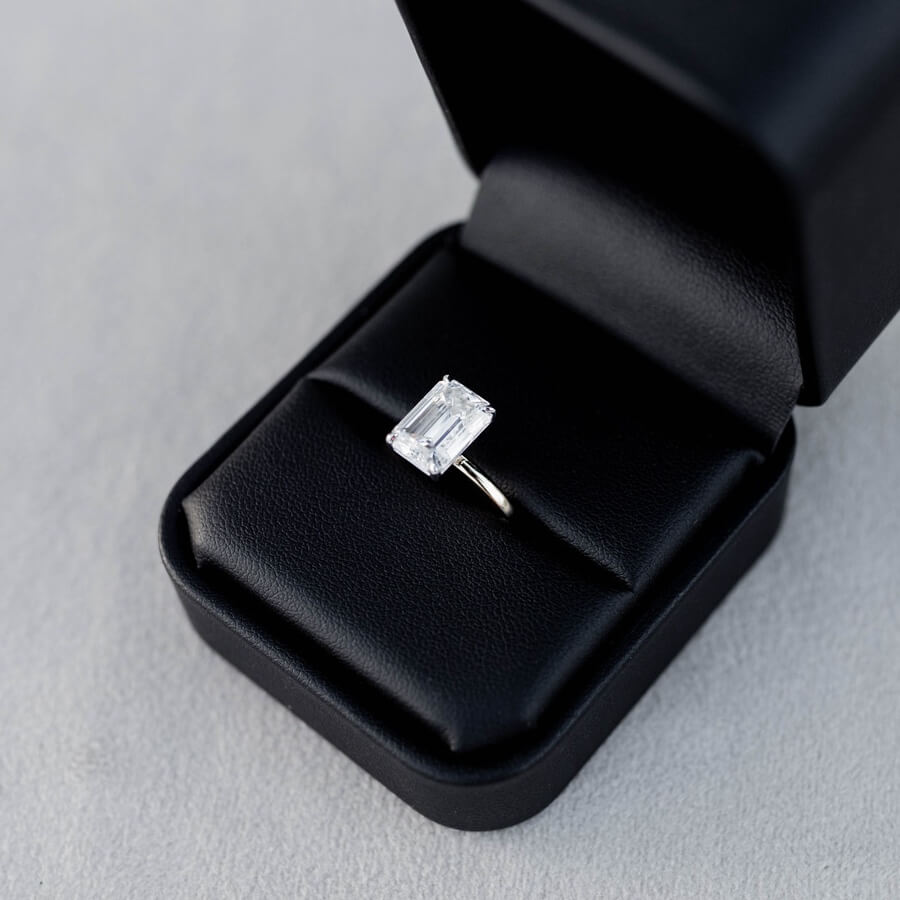 Shown with 3ct (10x7mm) Moissanite