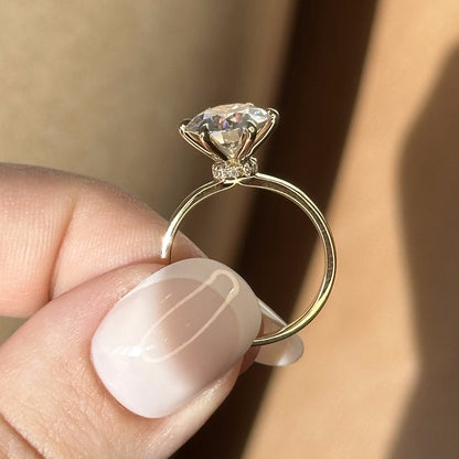 Shown with 3ct (9mm) Moissanite