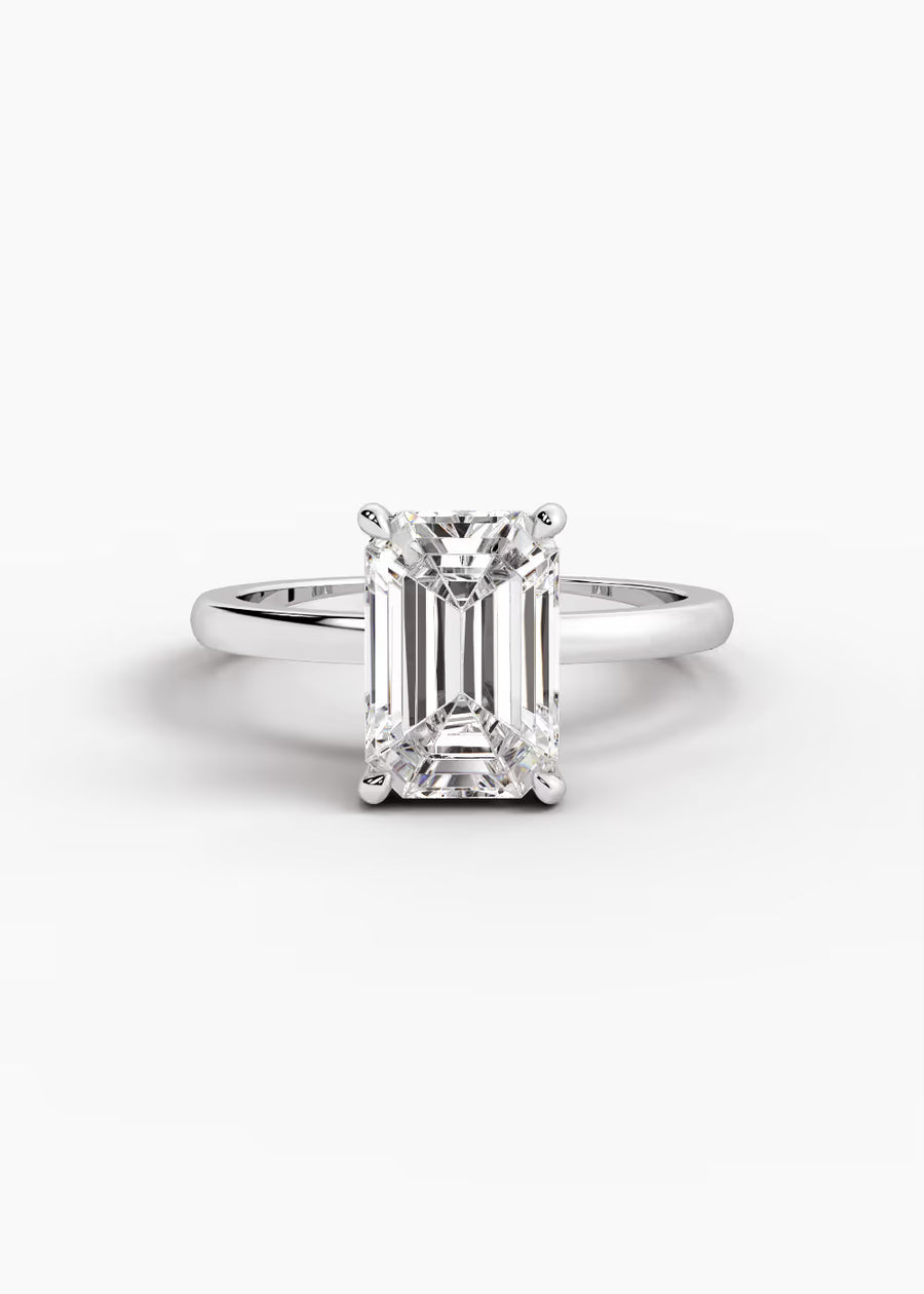 WG: The Aura · Emerald — white gold view 1