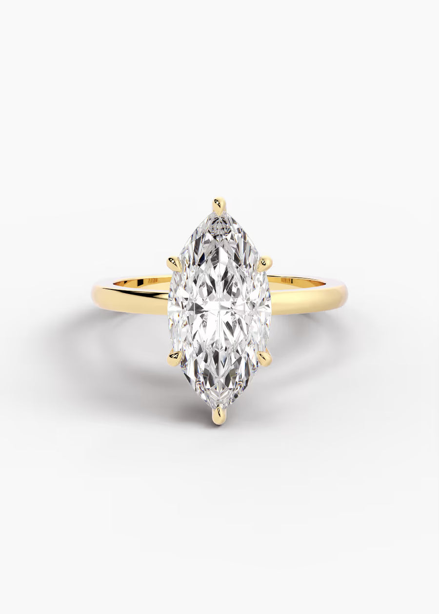 YG: The Aura · Marquise — yellow gold view 1