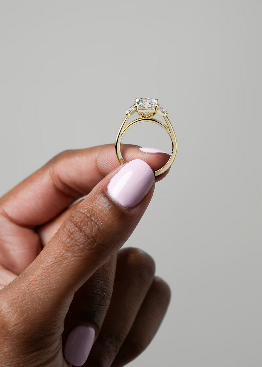 Hand Holding Ring