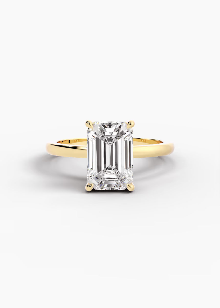 YG: The Signature · Emerald — yellow gold view 1