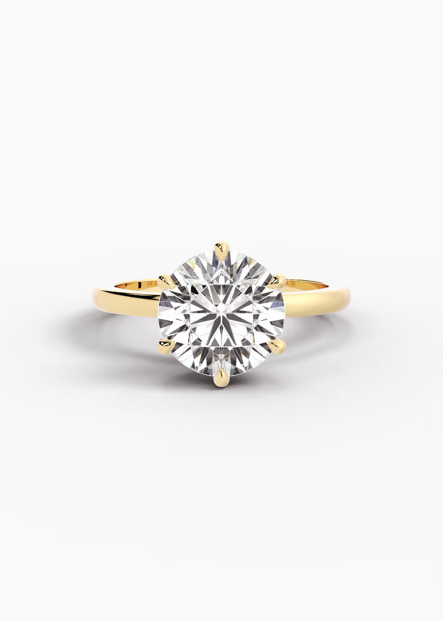 YG: The Signature · Round — yellow gold view 1