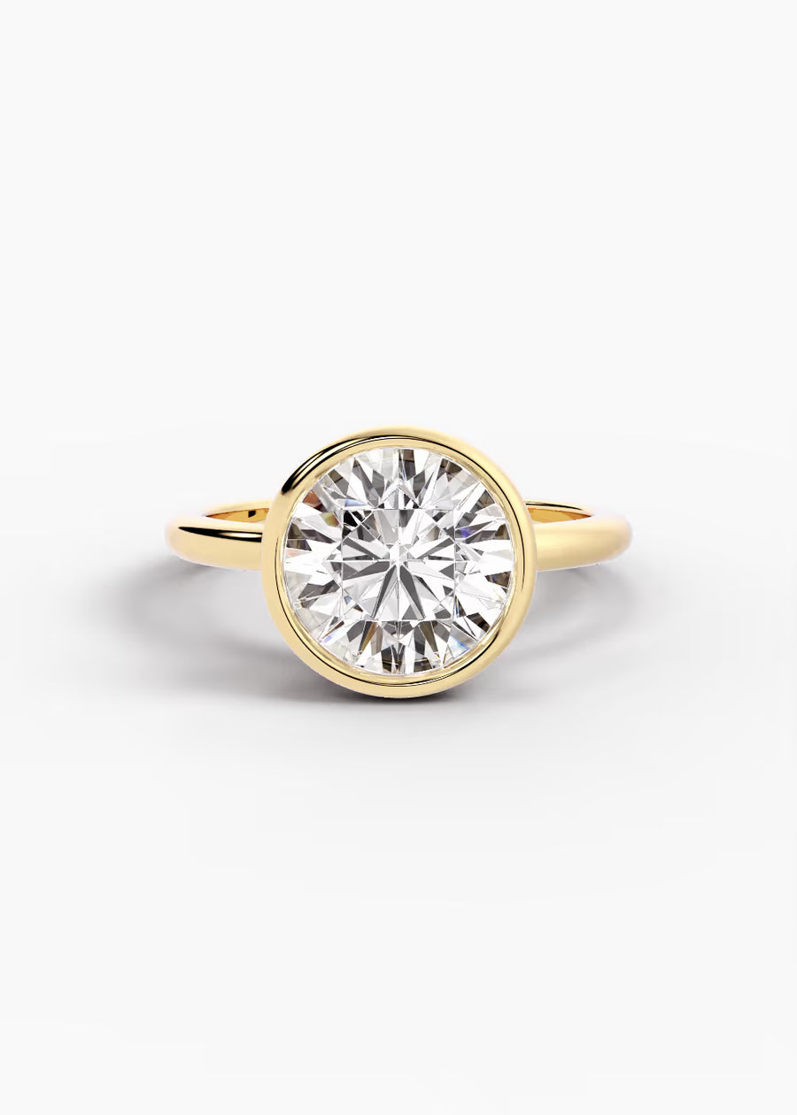 YG: The Silhouette · Round — yellow gold view 1