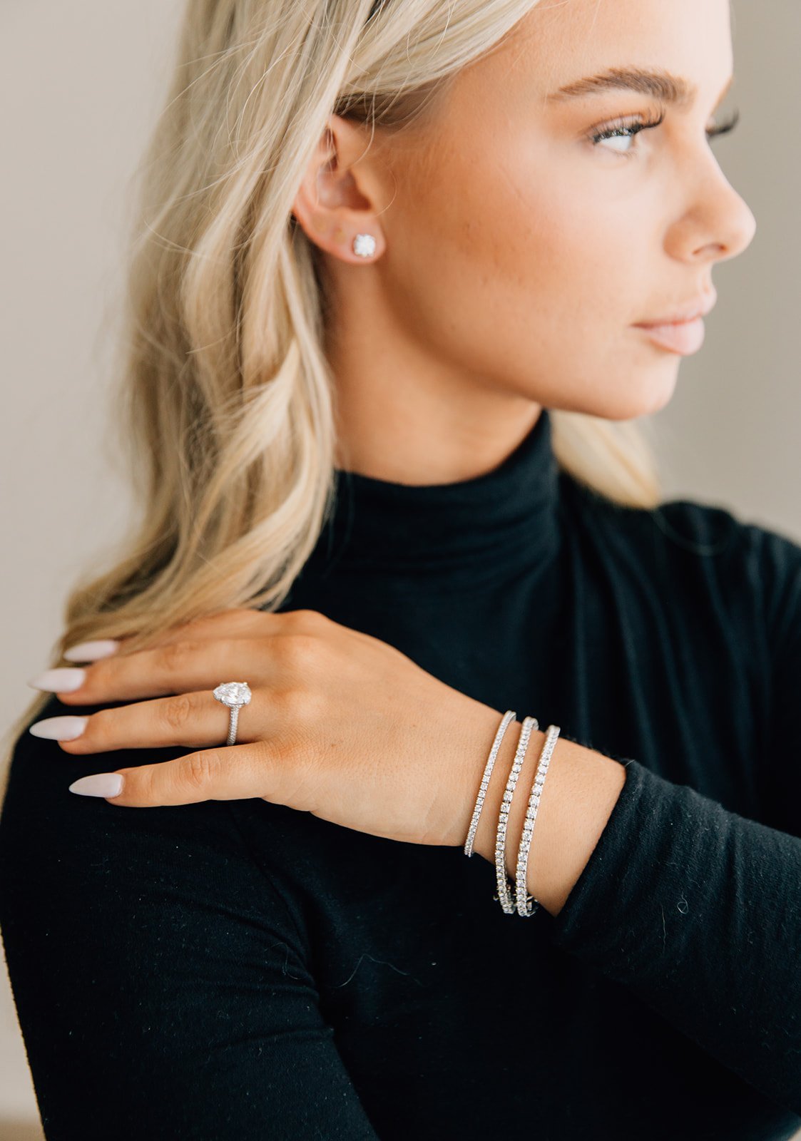 natural diamond tennis bracelets with a natural three carat pear diamond and diamonds on the band